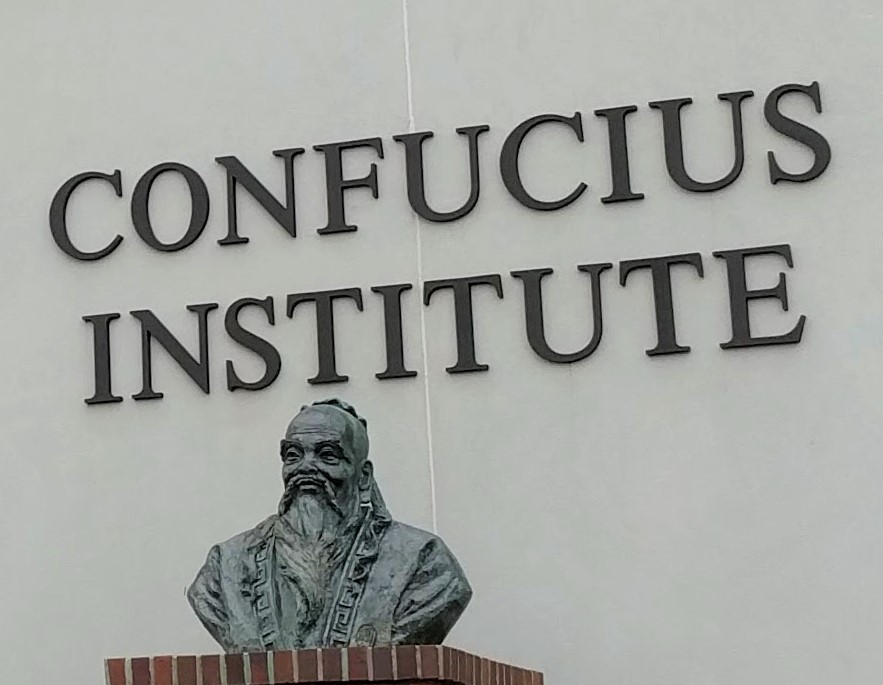 "File:Bust of Confucius, Confucius Institute building on the Troy University campus, Troy, Alabama on 16 March 2018 (cropped).jpg" by Kreeder13 is licensed under CC BY-SA 4.0